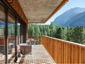 Отель Alpine Lodge Chesa al Parc, Понтрезина